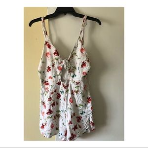 Floral romper with a front open